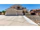 Charming two-story home featuring a three-car garage and a welcoming tiled roof at 2489 E Sequoia Dr, Chandler, AZ 85286