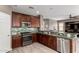 Well-equipped kitchen with stainless steel appliances and stylish backsplash at 2489 E Sequoia Dr, Chandler, AZ 85286