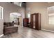 Spacious living room with high ceilings and hardwood floors, perfect for entertaining at 2489 E Sequoia Dr, Chandler, AZ 85286