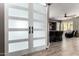 Spacious living room featuring sliding barn doors that add a touch of rustic charm at 2489 E Sequoia Dr, Chandler, AZ 85286