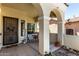 Inviting covered patio with a seating area, perfect for relaxing outdoors at 2489 E Sequoia Dr, Chandler, AZ 85286