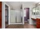 View of bathroom with shower and toilet and double sinks and cabinets at 2718 S Cupertino Dr, Gilbert, AZ 85295