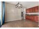 Bright dining area with tile floors, modern light fixture and convenient access to the kitchen at 2718 S Cupertino Dr, Gilbert, AZ 85295
