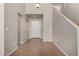 Bright foyer with neutral walls, tile flooring, a coat closet and a view of the staircase at 2718 S Cupertino Dr, Gilbert, AZ 85295