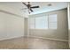 Bright living room with large windows, allowing ample natural light to illuminate the space at 2718 S Cupertino Dr, Gilbert, AZ 85295