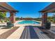 Symmetrical view of the pool area offering shade and a welcoming atmosphere for relaxation and recreation at 2718 S Cupertino Dr, Gilbert, AZ 85295