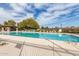 Enjoy a refreshing swim in this community pool surrounded by lush greenery and comfortable lounge chairs at 2718 S Cupertino Dr, Gilbert, AZ 85295