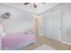 Cozy bedroom featuring playful decor, soft carpet, and a spacious closet at 2856 E Desert Broom Pl, Chandler, AZ 85286