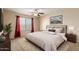 Bright bedroom features large window with neutral furnishings at 30617 N 138Th Way, Scottsdale, AZ 85262