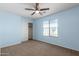 Bedroom features light blue walls, closet and window with blinds at 30617 N 138Th Way, Scottsdale, AZ 85262