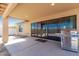 Spacious covered patio with gas grill, perfect for outdoor entertaining and backyard barbecues at 30617 N 138Th Way, Scottsdale, AZ 85262