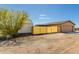 Backyard view with a shed, privacy fence, and access to the home's garage at 30617 N 138Th Way, Scottsdale, AZ 85262