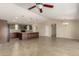Spacious kitchen with a large island, granite countertops, and dark wood cabinets at 30617 N 138Th Way, Scottsdale, AZ 85262