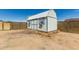 Backyard features a charming storage shed with double doors and decorative window boxes at 30617 N 138Th Way, Scottsdale, AZ 85262