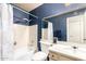 Bathroom featuring a single sink and bath tub with shower head at 325 E Sharon Ave, Phoenix, AZ 85022