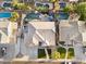 Aerial view of a well-maintained home showcasing a private backyard oasis and neighborhood pools at 3445 E Pageant Pl, Gilbert, AZ 85297