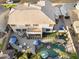 Aerial view showcasing a private backyard featuring pool, patio and landscaped hardscape at 3445 E Pageant Pl, Gilbert, AZ 85297