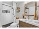This bathroom features subway tile, a single vanity, and decorative accents at 3445 E Pageant Pl, Gilbert, AZ 85297