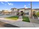Charming two-story home with three-car garage and well-manicured front yard at 3445 E Pageant Pl, Gilbert, AZ 85297
