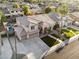 Beautiful two-story home featuring a three car garage, manicured lawn and walkway at 3445 E Pageant Pl, Gilbert, AZ 85297