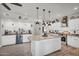 Well-designed kitchen with stainless steel appliances and a granite island, open layout perfect for entertaining at 3445 E Pageant Pl, Gilbert, AZ 85297