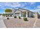 Street view of a single-story home boasting desert landscaping and a private drive at 36522 W Santa Monica Ave, Maricopa, AZ 85138