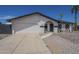 Lovely home with desert landscaping, complemented by a spacious driveway and attached two-car garage at 3722 W Michelle Dr, Glendale, AZ 85308
