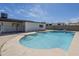 A refreshing in-ground pool with diving board enhances this private backyard oasis at 3722 W Michelle Dr, Glendale, AZ 85308