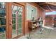 Enclosed backyard with a sliding door and storage shelf, perfect for gardening and outdoor projects at 3836 W Desert Cove Ave, Phoenix, AZ 85029