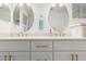 Bright bathroom featuring a double sink vanity with modern fixtures and ample storage at 3971 N 151St Ln, Goodyear, AZ 85395