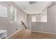 Upstairs hallway area with natural light and beige colored walls at 4068 E Devon Dr, Gilbert, AZ 85296