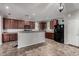 Bright kitchen features updated cabinets, modern appliances, and eat in counter space at 4068 E Devon Dr, Gilbert, AZ 85296