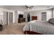 Bedroom featuring neutral-toned walls and carpet, and a doorway to the ensuite at 4068 E Devon Dr, Gilbert, AZ 85296