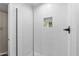 Modern shower with white subway tile surround and a niche for storage at 4418 E Paradise Ln, Phoenix, AZ 85032