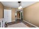 Bedroom featuring a modern light fixture and an open doorway leading into other rooms at 4418 E Paradise Ln, Phoenix, AZ 85032