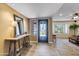 Bright foyer featuring stylish flooring, and a view into other living spaces at 4418 E Paradise Ln, Phoenix, AZ 85032