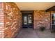 Close-up of the inviting brick entryway with the front door at 4418 E Paradise Ln, Phoenix, AZ 85032