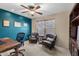 Bright office with blue accent wall and traditional furniture at 4418 E Paradise Ln, Phoenix, AZ 85032