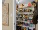 Pantry stocked with an abundance of food, spices, and cooking ingredients at 4418 E Paradise Ln, Phoenix, AZ 85032