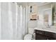 Bathroom features a toilet, a shower curtain, vanity and a mirror at 4535 E Navigator Ln, Phoenix, AZ 85050