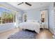 A bright primary bedroom offers ample natural light and a tranquil color scheme that adds a relaxing retreat at 4535 E Navigator Ln, Phoenix, AZ 85050