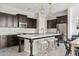 Stylish kitchen with stainless steel appliances, marble countertops, and a kitchen island at 4535 E Navigator Ln, Phoenix, AZ 85050