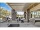 Outdoor kitchen with built-in BBQ, sink, and counter space, perfect for entertaining by the pool at 4535 E Navigator Ln, Phoenix, AZ 85050
