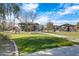 Community playground surrounded by grass and shaded picnic area at 4535 E Navigator Ln, Phoenix, AZ 85050