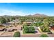 Beautiful aerial shot of the neighborhood showcasing lush greenery and mountain views at 4634 E Wilshire Dr, Phoenix, AZ 85008