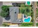 Aerial view showcasing the home's backyard oasis with a sparkling pool and patio area at 4634 E Wilshire Dr, Phoenix, AZ 85008