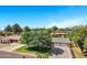 Expansive aerial view of the property showcasing lush landscaping and a desirable neighborhood at 4634 E Wilshire Dr, Phoenix, AZ 85008