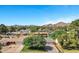 Scenic aerial view featuring a well-maintained home in a vibrant neighborhood with mountain views at 4634 E Wilshire Dr, Phoenix, AZ 85008