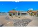Charming single-story home boasting desert landscaping and a two car garage at 4902 E Golden St, Mesa, AZ 85205