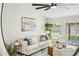 Bright and airy living room with modern furniture and an open floor plan at 4902 E Golden St, Mesa, AZ 85205